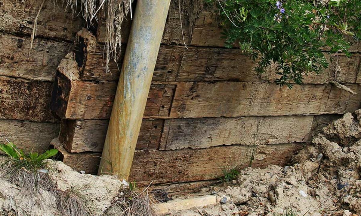collapsing timber retaining wall repair 
