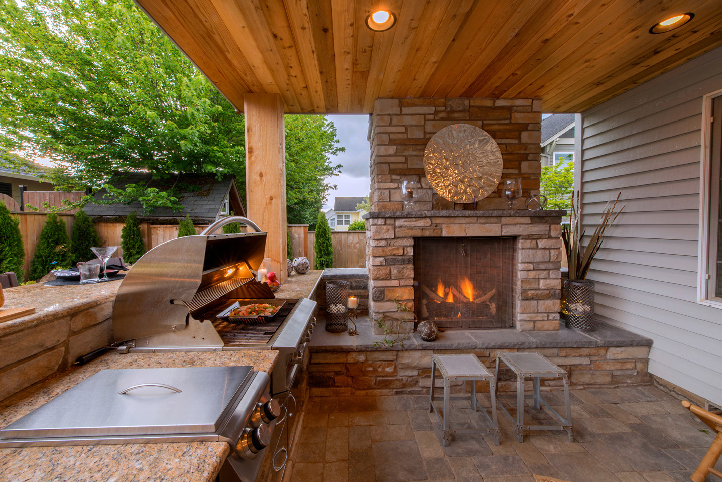 Covered Outdoor Kitchen Ideas Next to Fireplace