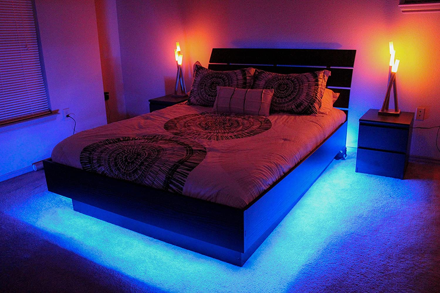 A floating bed with lights