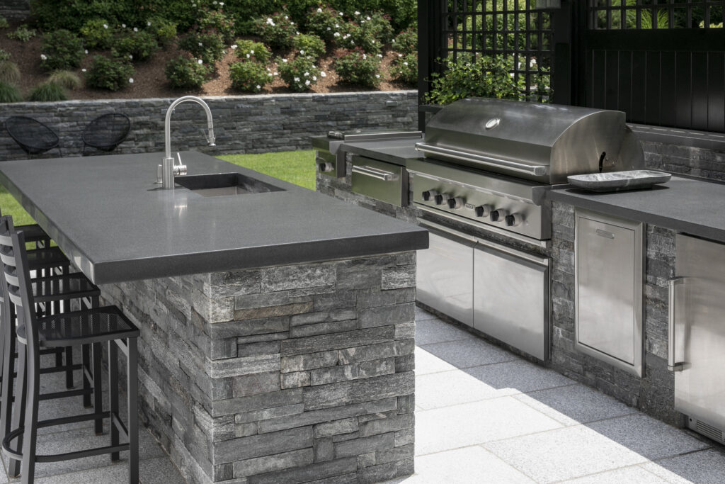 Outdoor kitchen ideas with grey stone