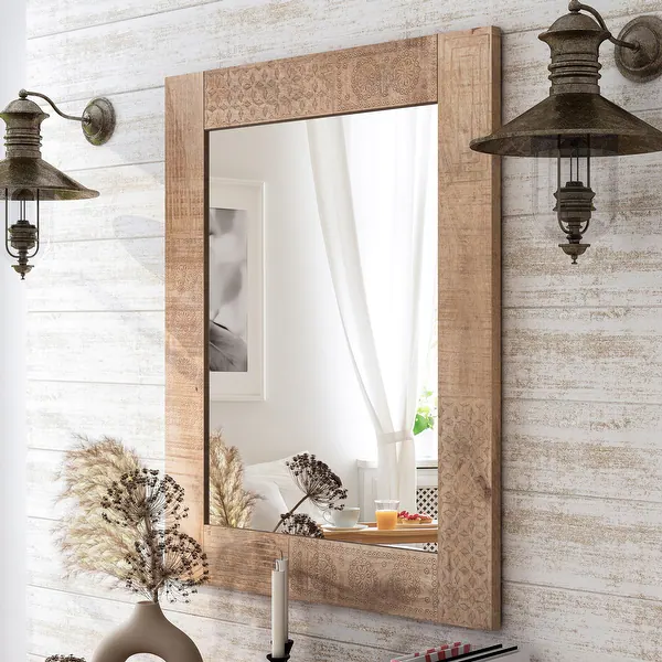 Rustic sconce in bathroom mirror