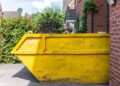 big yellow rubbish skip bin