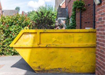 big yellow rubbish skip bin