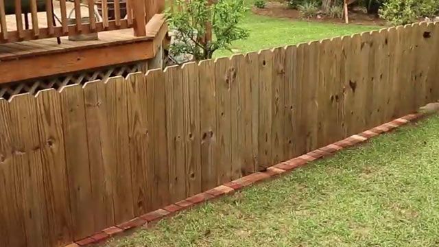 bottom of fence gap ideas with brick lining