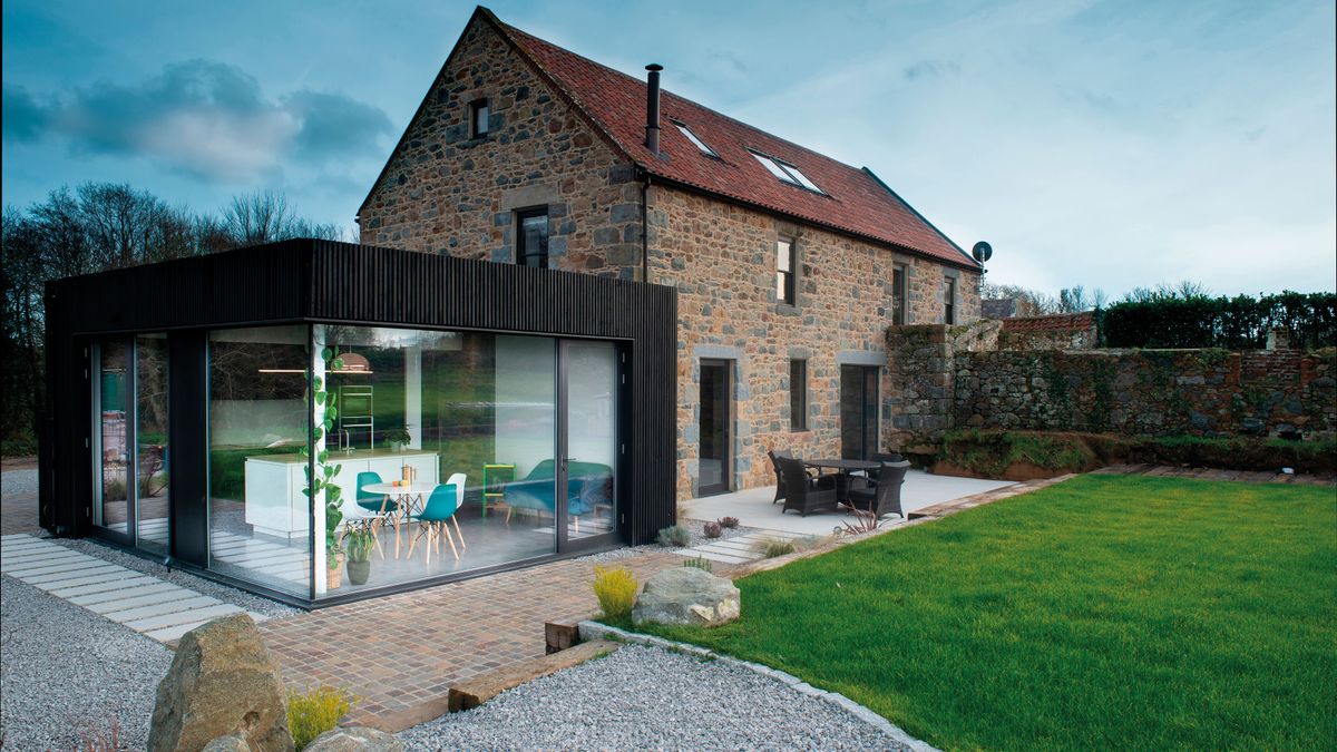 concrete and dark shades to create an accent second-storey extension