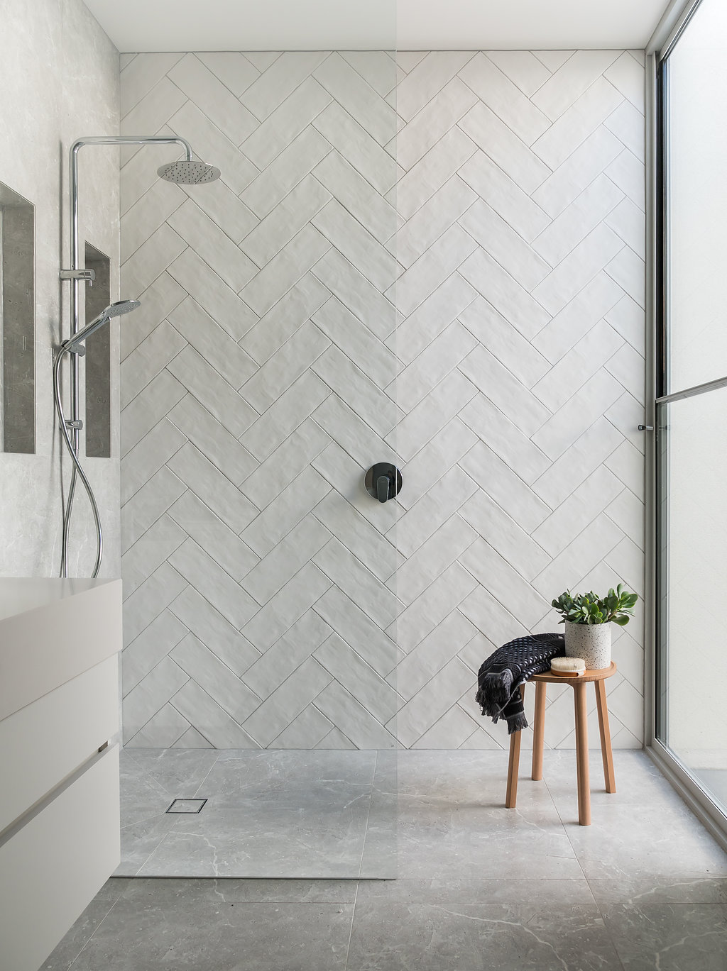 vertically angled tiles for small bathroom